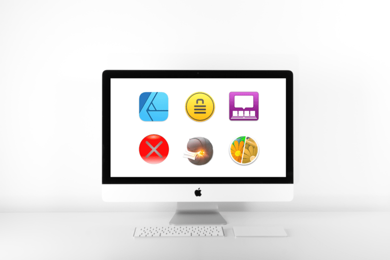 Mac monitor in white room with a white desktop displaying app icons featured in the associated article